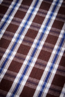 Arka plan doku olarak renkli kareli gömlek