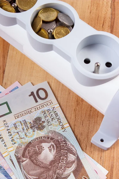 Electrical power strip and polish currency, energy costs — Stockfoto