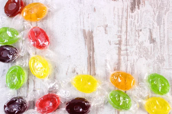 Marco de caramelos coloridos, espacio de copia para texto — Foto de Stock
