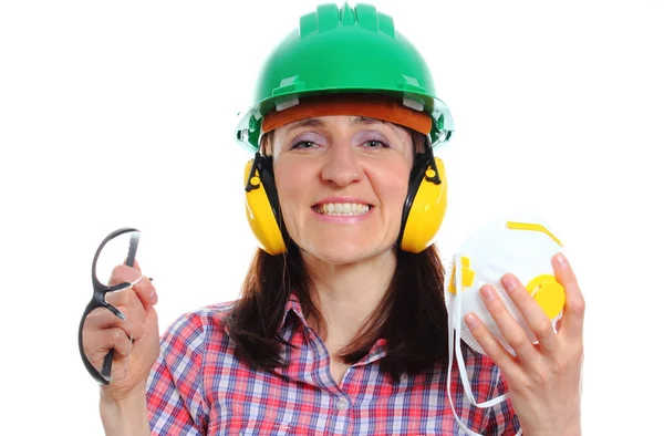 Woman with protective helmet, headphones, mask and spectacles — Stock Photo, Image