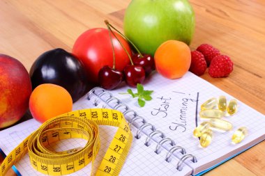 Meyve, Tablet takviyeleri ve santimetre ile defter, zayıflama ve sağlıklı gıda