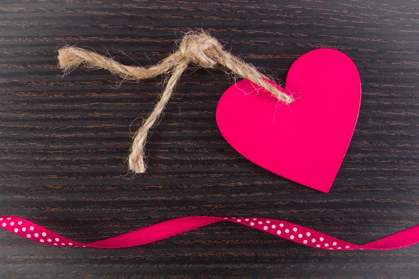 Decoration of pink wooden heart with ribbon for Valentines Day — Stock Photo, Image