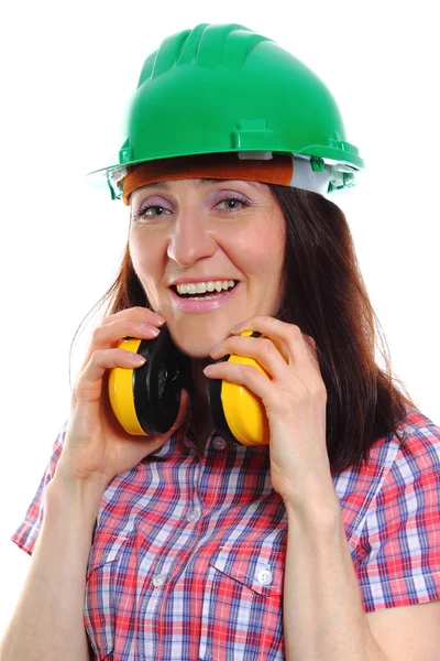 Žena nosí ochranné přilby a sluchátka — Stock fotografie