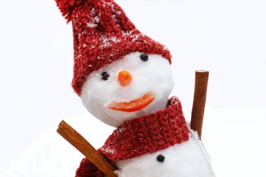 Snowman wrapped woolen scarf and cap, winter season concept