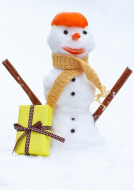 Snowman with woolen scarf and tangerine peel, gift for Valentines Day