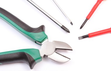 Pliers and screwdrivers isolated on white background