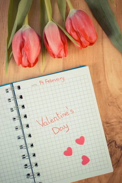 Vintage photo, Valentines Day written in notebook, fresh tulips and hearts, decoration for Valentines — Φωτογραφία Αρχείου