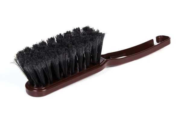 New brown broom for cleaning on white background — Stock Photo, Image