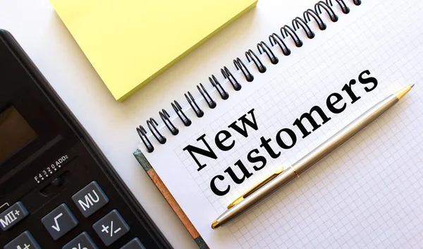 Notepad Text New Customers Next Lies Calculator Yellow Note Papers — Stock Photo, Image