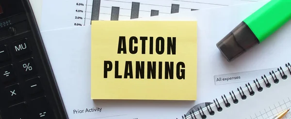 Text Action Planning Sidan Ett Anteckningsblock Som Ligger Finansiella Diagram — Stockfoto