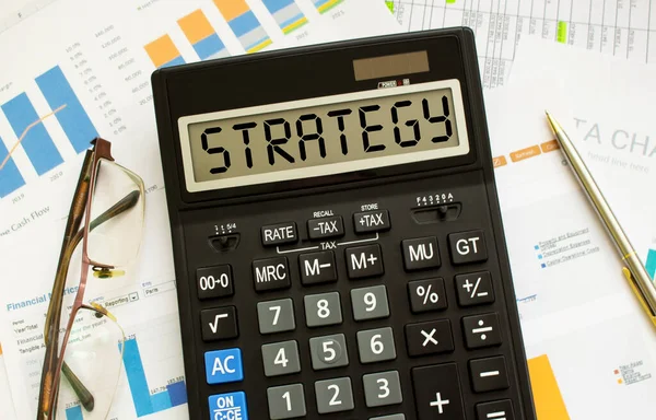 Calculator Labeled Strategy Lies Financial Documents Office Business Concept — Stock Photo, Image