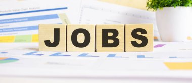 Tahta küplerle ilgili bir iş. Arka plan bir iş grafikleri. Finans kavramı