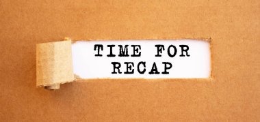 Text TIME FOR RECAP appearing behind torn brown paper. For your design, concept. clipart