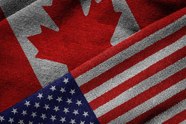 Banderas de Estados Unidos y Canadá sobre textura grunge —  Fotos de Stock