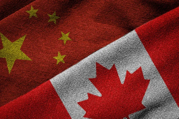 Флаги Китая и Канады на гранж-текстуре — стоковое фото