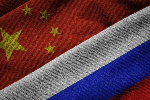Vlajky Číny a Ruska na Grunge textury — Stock fotografie
