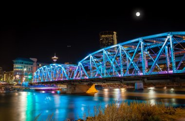 Full Moon Over Langevin Bridge in Downtown Calgary clipart