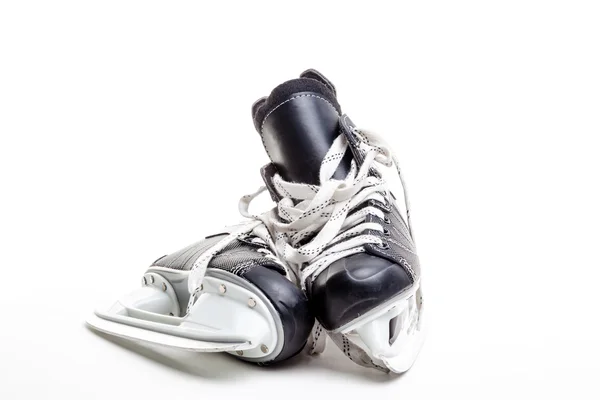 Un par de patines de hockey sobre hielo — Foto de Stock