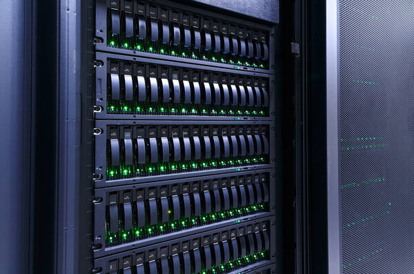 servers stack with hard drives in datacenter for backup and data storage