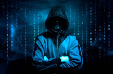 İkili kodlu bir ekranın üzerindeki hacker