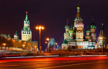 church and towers of Kremlin at night. view from Novokuznetsk bridge. Tracers from cars.