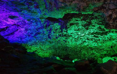 Texture of rock , covered with frost inside the cave, numerous mining deposits. Kungur In Urals
