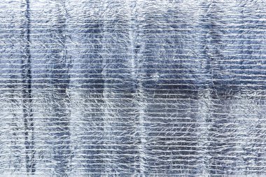 Gümüş pürüzlü folyo dokusu. Folyo folyo dokusu arkaplanı