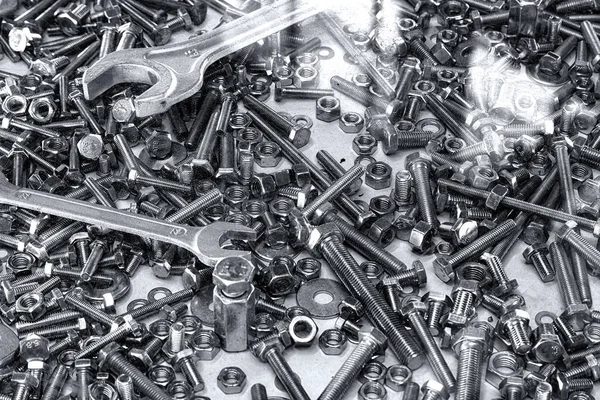 Macro shot of a spanner, nuts and bolts useful as a background