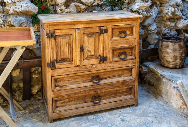 Antique italian wooden dresser, vintage old wood. Front view. Vintage style.
