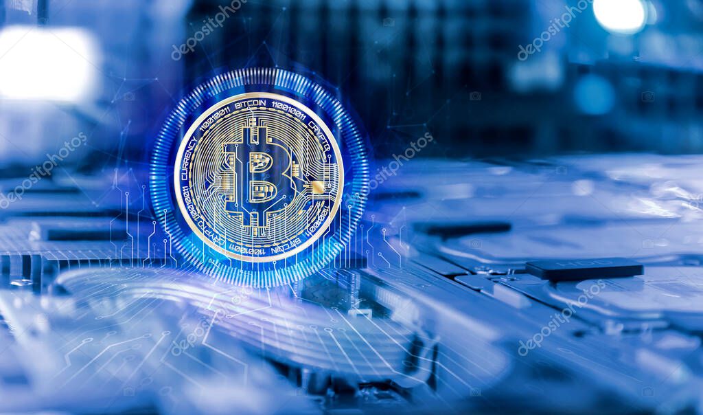 Bitcoin with electronic spikes Inside high performance computer server depth of field blur. Computer circuit board concept of cryptocurrency mining