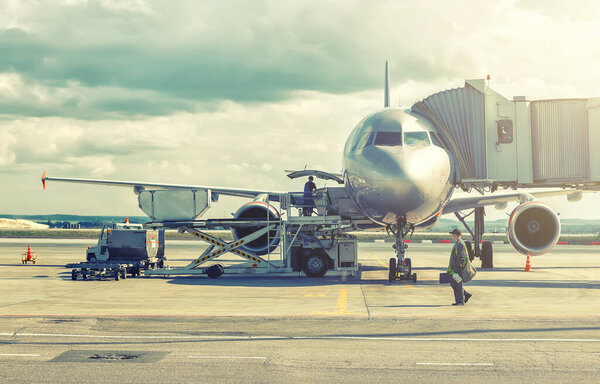 Commercial airplane parked at the airport