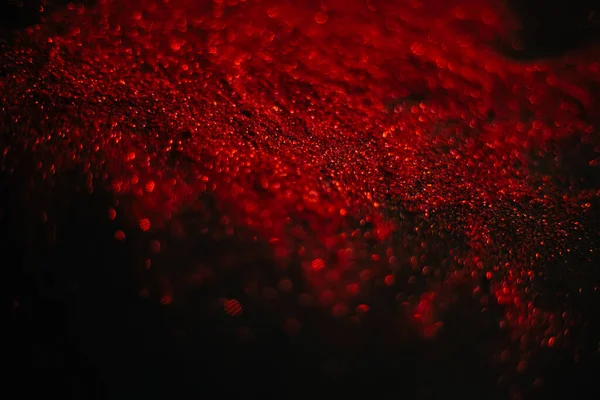 Red Sand Sequins Scattered Sparkles Black Background Space Texture — Stock Photo, Image