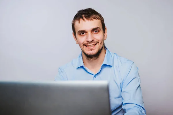 Young Handsome Man Blue Shirt Sits Computer Office Worker White Stock Image
