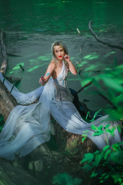 Beautiful Girl Transparent White Cloth Sits Branch Swamp Mermaid Diadem — Stock Photo, Image
