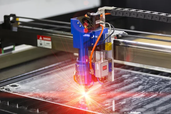 CNC laser cutting metal sheet — Stock Photo, Image