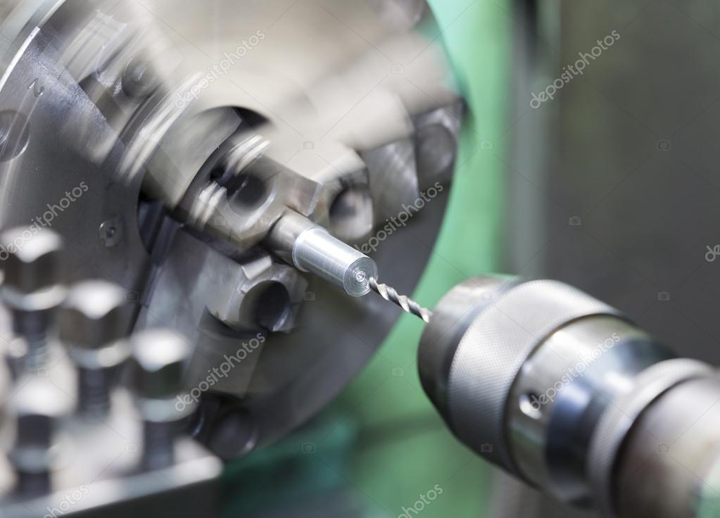Drilling by lathe machine Stock Photo by ©sorapol1150 61832961