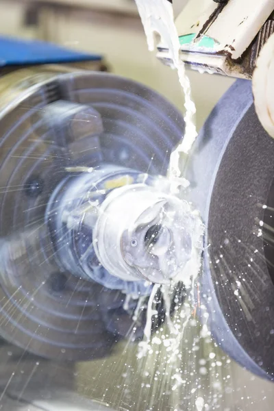 Operator grinding forging die parts — Stock Photo, Image