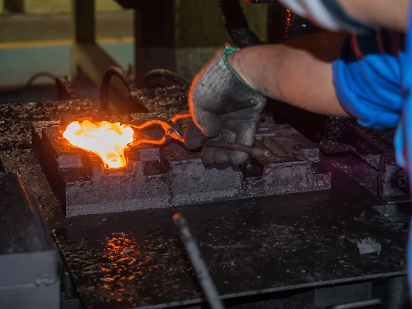 Operator forging steel automotive parts — Stock Photo, Image