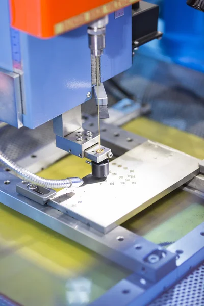 stock image operator use  EDM electrod to make precision mold and die
