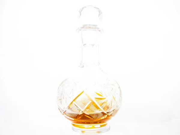 A decanter of brandy on a white background — Stock Photo, Image