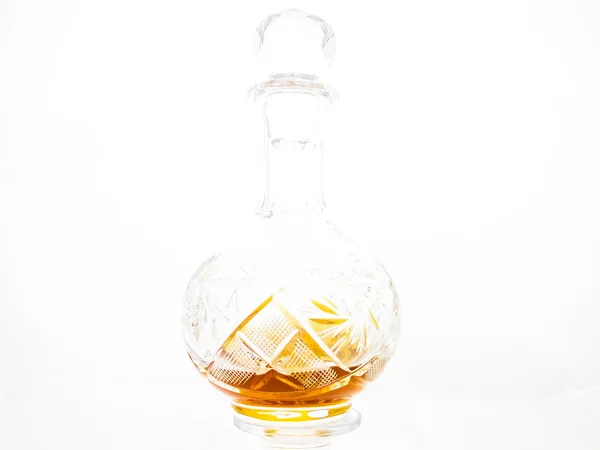 Un decanter di brandy su fondo bianco — Foto Stock