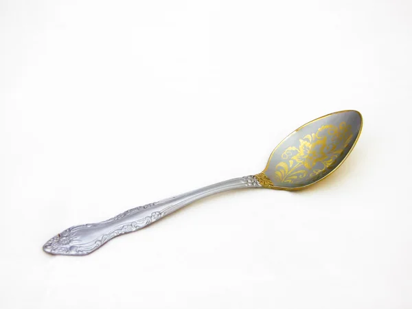 Silver tablespoon over a white background — Stock Photo, Image