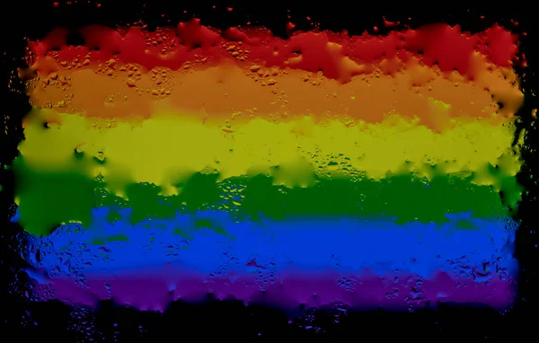 Wassertropfen Auf Dem Hintergrund Der Regenbogenflagge Geringe Schärfentiefe Selektiver Fokus — Stockfoto