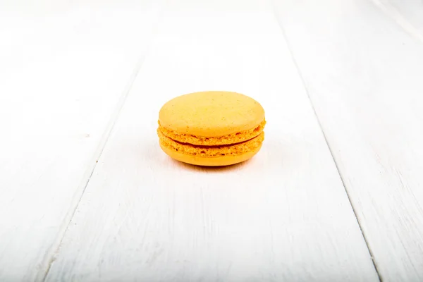 Set of macarons on white wooden table — Stock Photo, Image