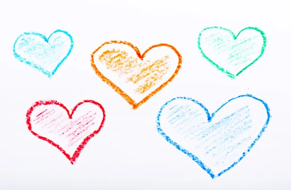 Pencil drawn hearts with different colours on white paper — Stock Photo, Image