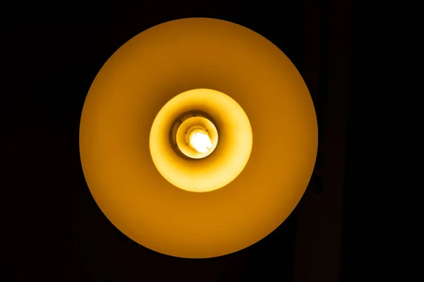 LED Fluorescent light on dark ceiling