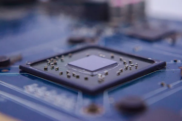 Graphic card Processors. Macro view of a Futuristic Electronic Circuit Board with Microchips and Processors. Technology Background concept. Selective focus