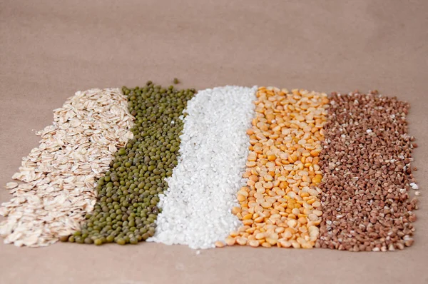 Strips Cereals Oatmeal Mash Rice Peas Buckwheat Table — Stock Photo, Image