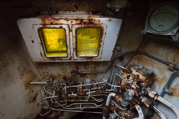 Soviet military engineering vehicle cockpit with yellow lead glass for radiation protection in Chernobyl