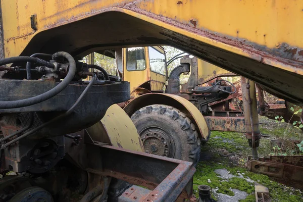 Abandoned radioactive vehicle, old rusty truck near ghost town Pripyat, post apocalyptic city, autumn season in Chernobyl exclusion zone, Ukraine